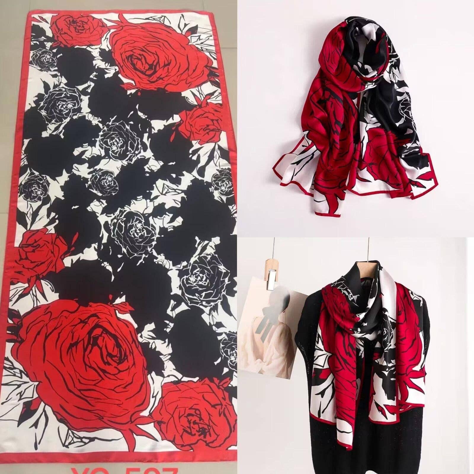 Scarves with red, black, and white floral pattern on a white background