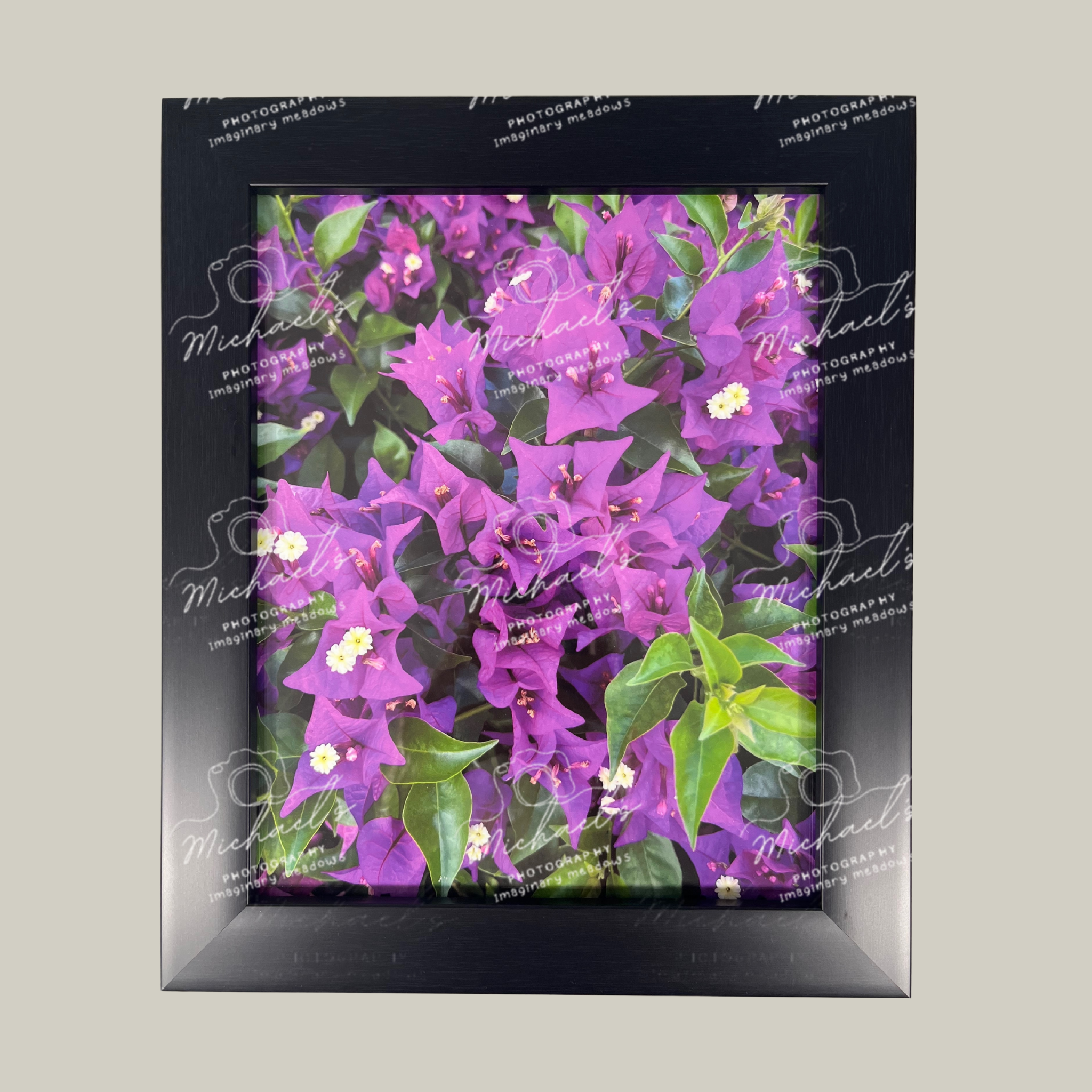 Matt black framed artwork with purple bougainvillea flowers and green leaves 