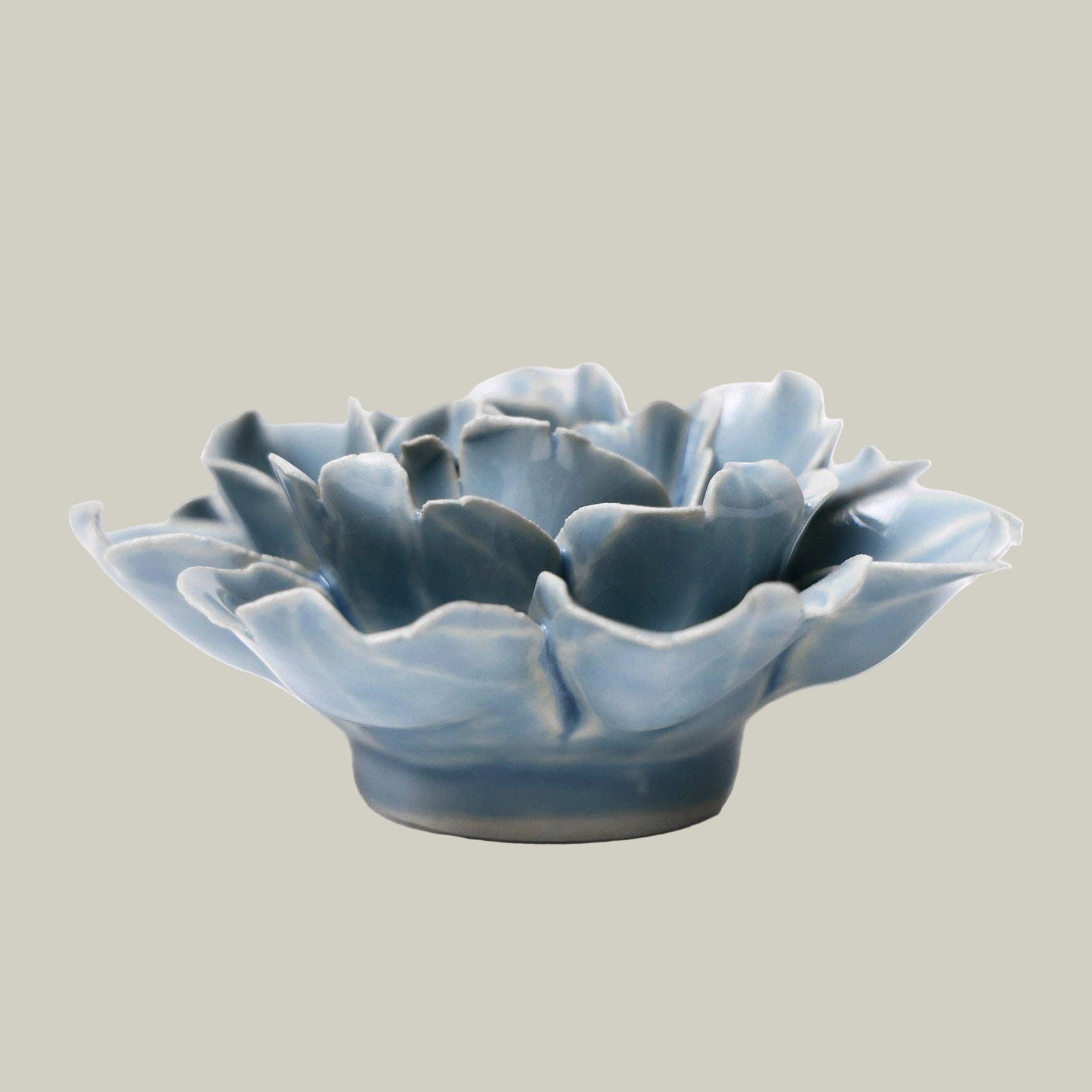 Side view of a Beautiful Azure ceramic Peony sculpture