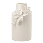 White ceramic vase with crackle glaze and  sculpted floral appliqué on a white background