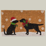 Doormat with two black dogs rubbing noses, wearing Christmas attire.