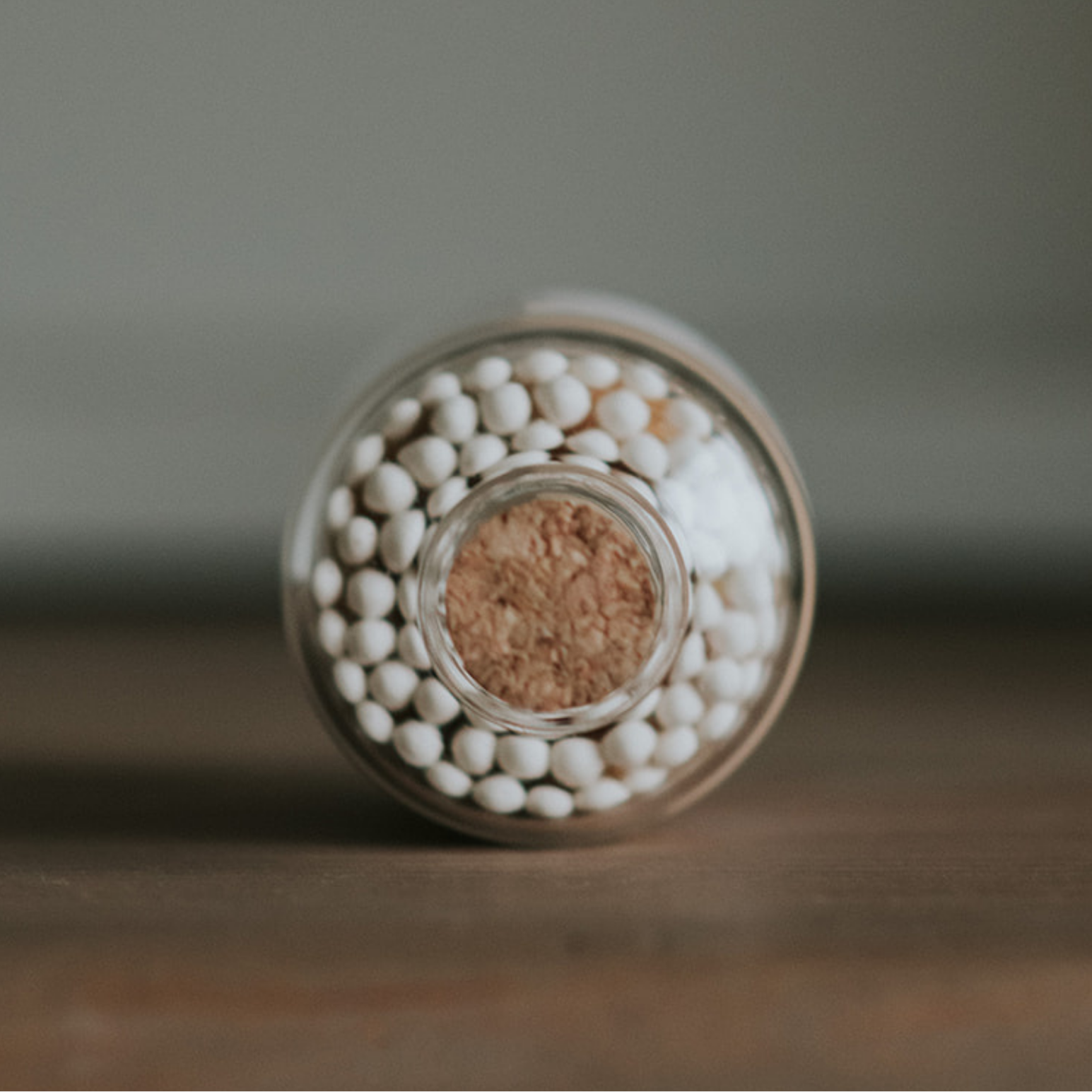 White match jar with cork lid on a dark background