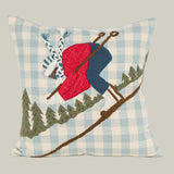 Decorative pillow with skiing design on a checkered background