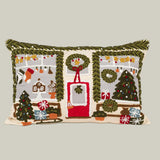 Decorative pillow with Christmas-themed storefront embroidery on a white background