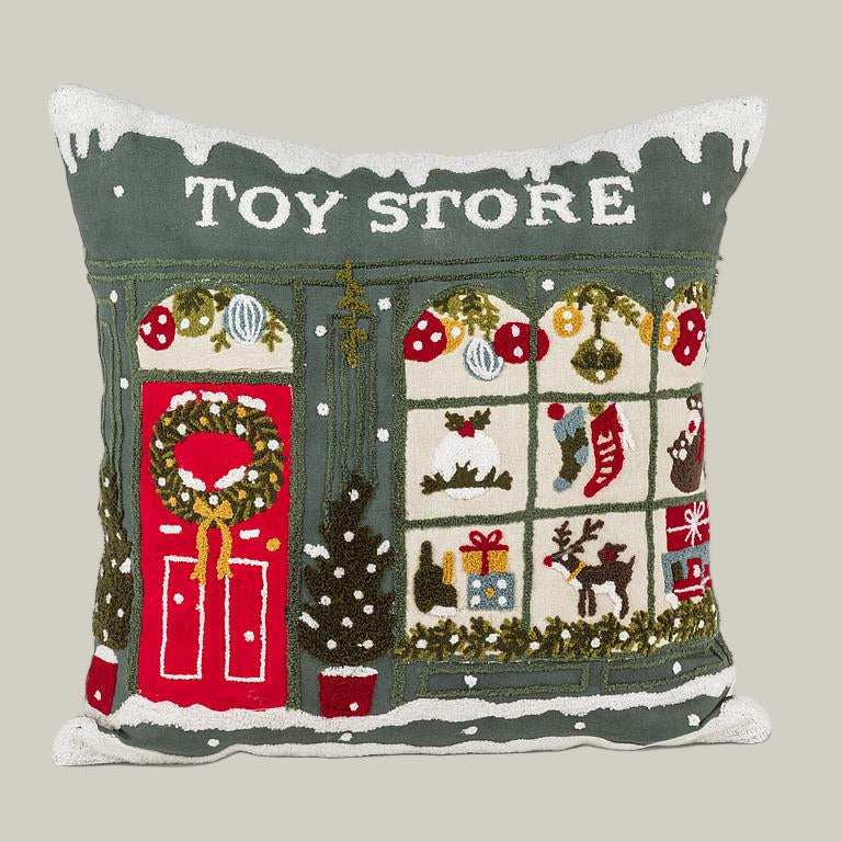 Decorative pillow with a Christmas-themed design of a toy store.