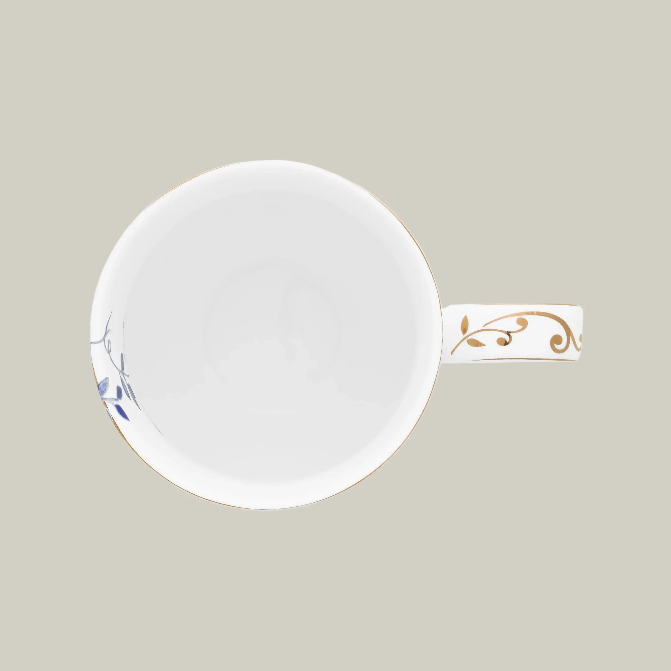 Top view of a porcelain mug from Pip Studio Royal White collection with blue floral design and gold accents.