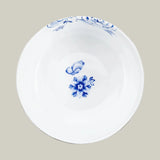 Top view of a porcelain bowl from Pip Studio Royal White collection with blue floral design and gold accents.