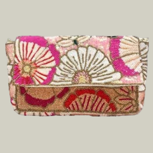 Decorative clutch bag with floral patterns on a light purple background