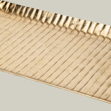 Gilded hearth tray featuring a rich gold finish and a beautiful, textured hammered aluminum surface.