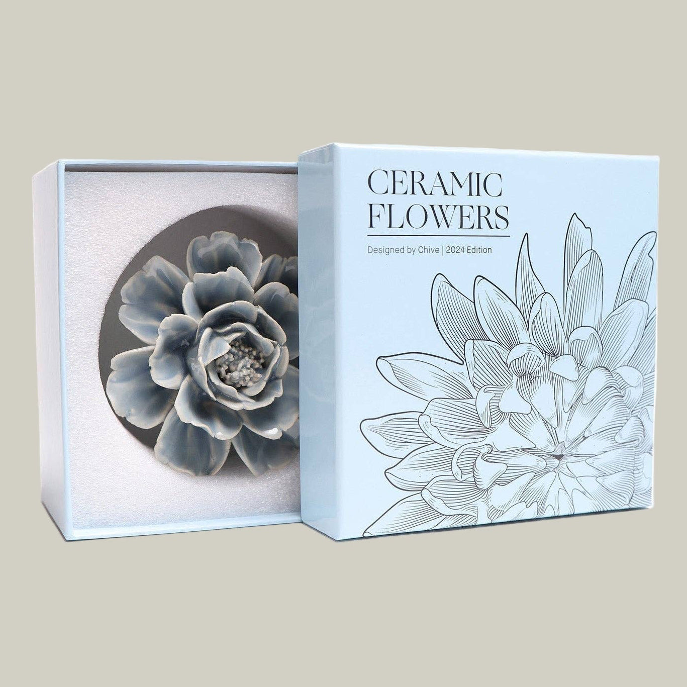 Beautiful Azure ceramic Peony sculpture in it's packaging