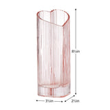 Blush coloured heart shaped glass vase on a white background with dimensions 8.5 inches tall, 2.5 inches wide, 3.5 inches deep.
