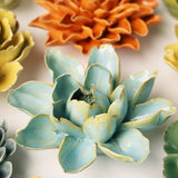 Colourful ceramic flower-shaped sculpture on a white background