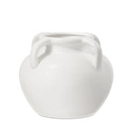 White ceramic vase with four loop handles on a white background