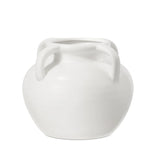 White ceramic vase with four loop handles on a white background