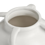 Close-up of a white ceramic vase with four loop style handles on a white background