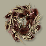 Meticulously crafted 10-inch accent wreath with it's lush burgundy red teasels providing a striking focal point against the delicate, ethereal sprays of Bupleurum in a soft pink and natural willow eucalyptus adds a graceful touch of olive green.