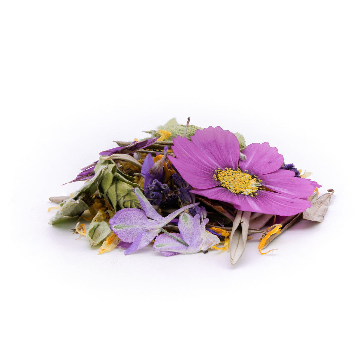 A small pile of dried botanicals and flowers on a clean white background, featuring a prominent purple cosmos flower with a yellow center surrounded by green and purple leaves.