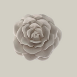 Decorative candle in container with floral designed lid