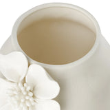 Close-up of the opening of a white ceramic vase with crackle glaze and a floral appliqué on a white background