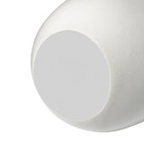 Close-up of the bottom of a white ceramic vase with crackle glaze and a floral appliqué on a white background. the bottom has a soft white foam covering to prevent surface scratches from occuring.