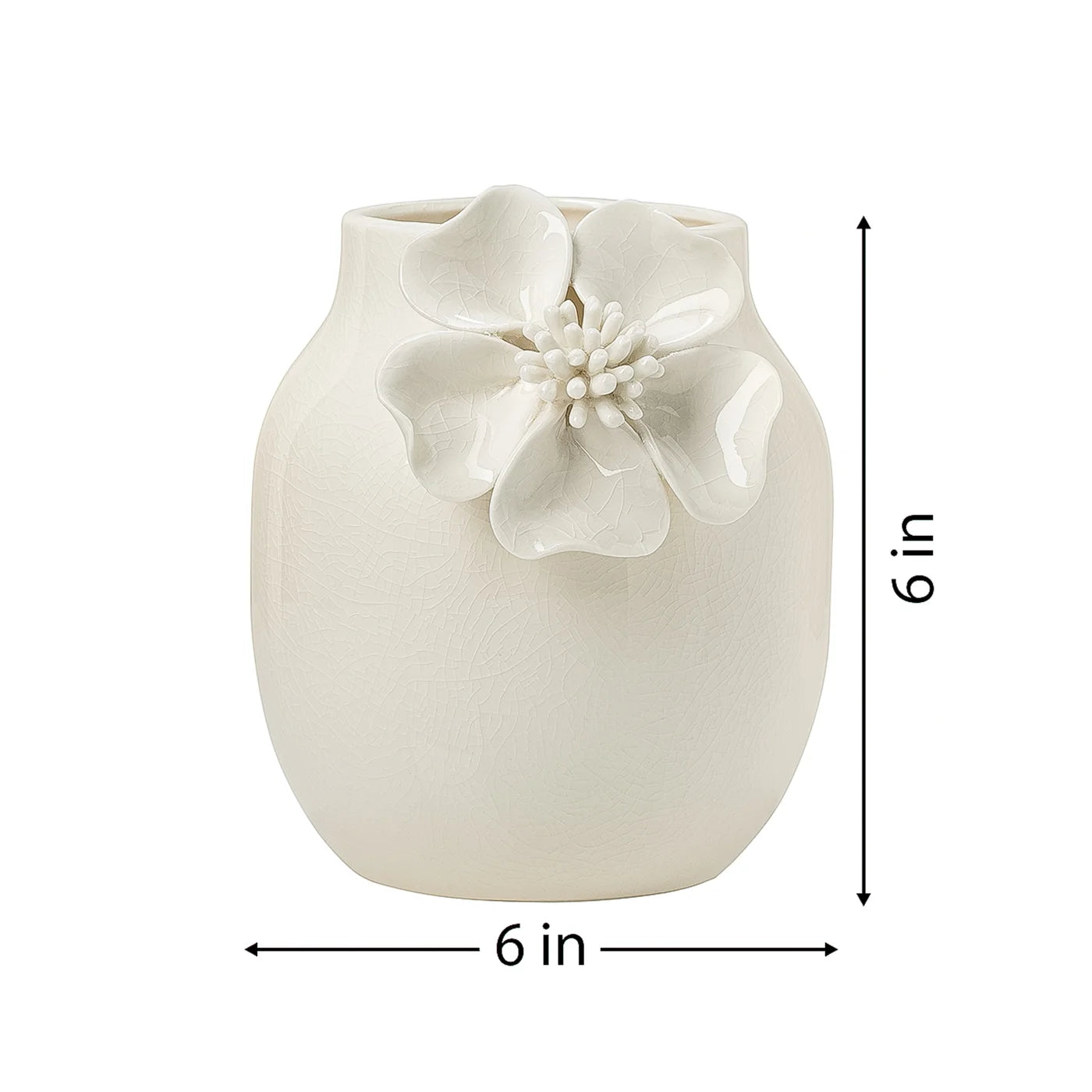 White ceramic vase with crackle glaze and a floral appliqué on a white background with dimensions of 6 inches tall and 6 inches in diameter.