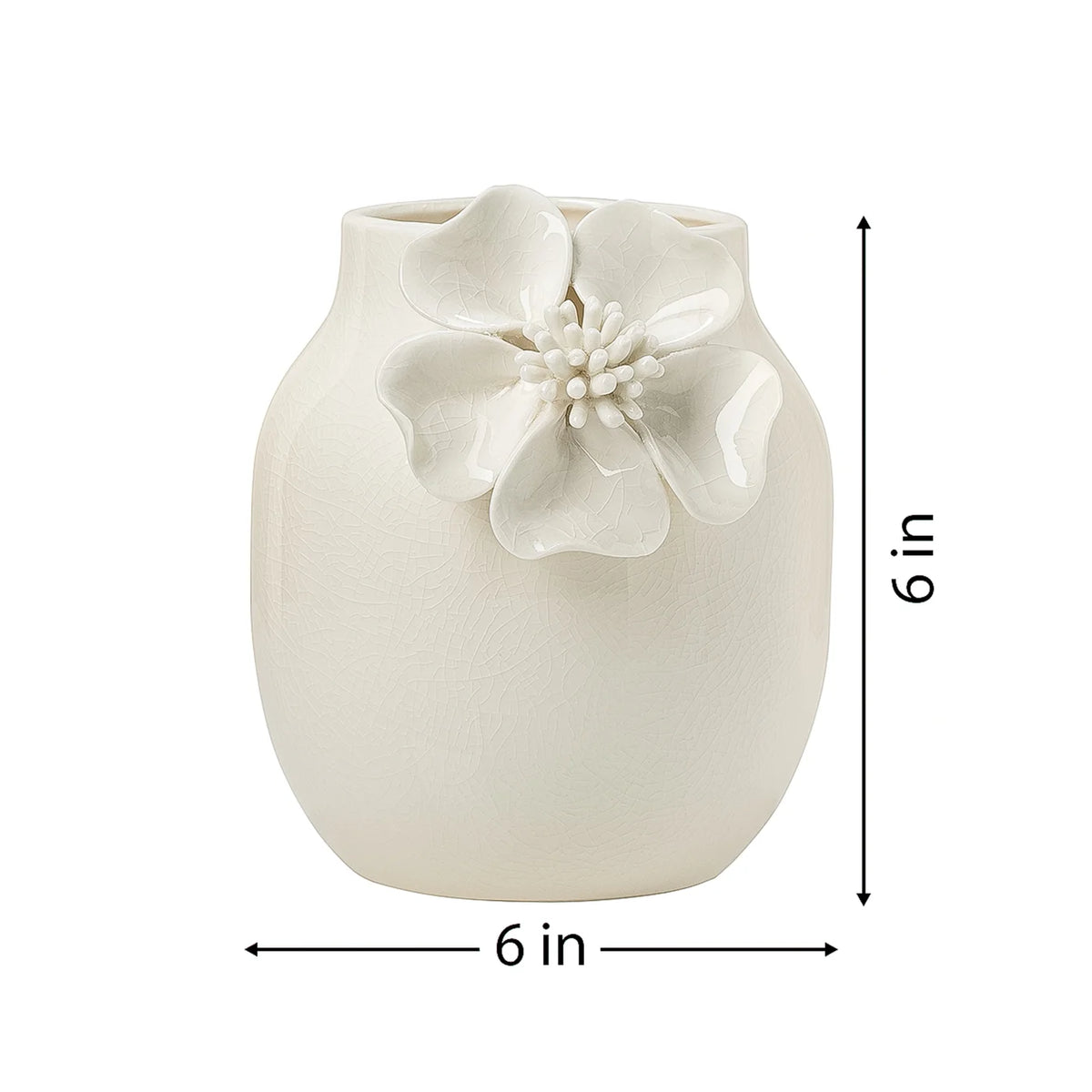 White ceramic vase with crackle glaze and a floral appliqué on a white background with dimensions of 6 inches tall and 6 inches in diameter.
