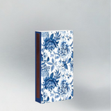 Blue and white chintz floral patterned box with blue flowers on a white background