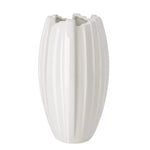 A white ceramic vase with a fluted, ribbed texture and a scalloped rim, shown against a plain white background.