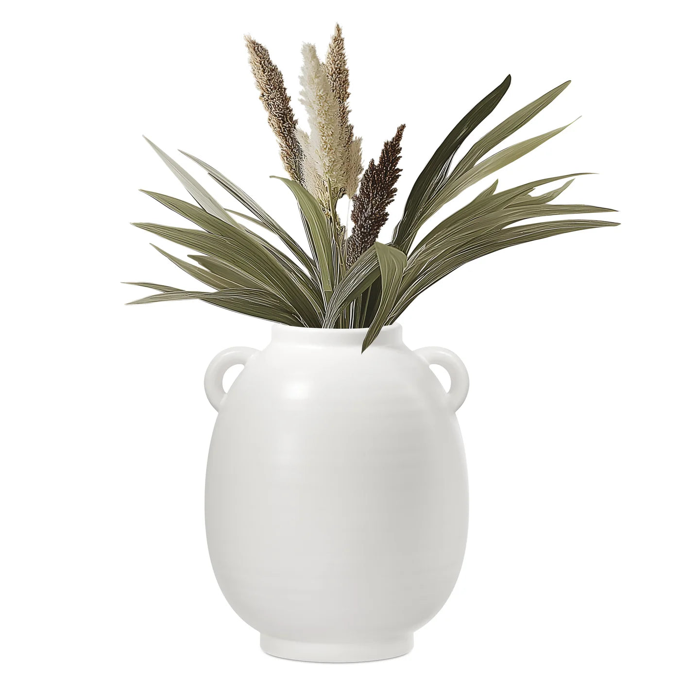White vase with green leaves and brown dried elements on a white background