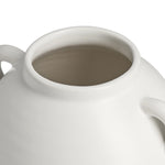 Close-up of a white ceramic vase with a beige interior on a white background