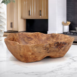 Beautiful hand carved Forest Legacy Bowl made from a fir stump left over from logging industry sitting on marble table.