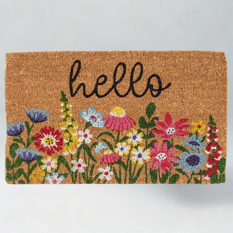 Doormat with floral design and 'hello' text on a plain background