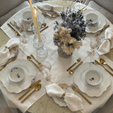 Elegant table setting featuring Pip Studio Royal White dinnerware and Royal Floral wine glasses, our Gilded Ribbon flatware, and a dried floral arrangement as a centrepiece.