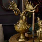 Eugene the Moose Bronze Bust in uniform sporting a monocle with his large antlers and sombre expression. He is a friendly, refined character who brings the charm and whimsical elegance of a storybook into your home.