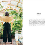 Person holding a yellow garment in a greenhouse with text on the right side.
