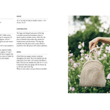 Woven handbag held by a person in a floral setting with product specifications on the left.