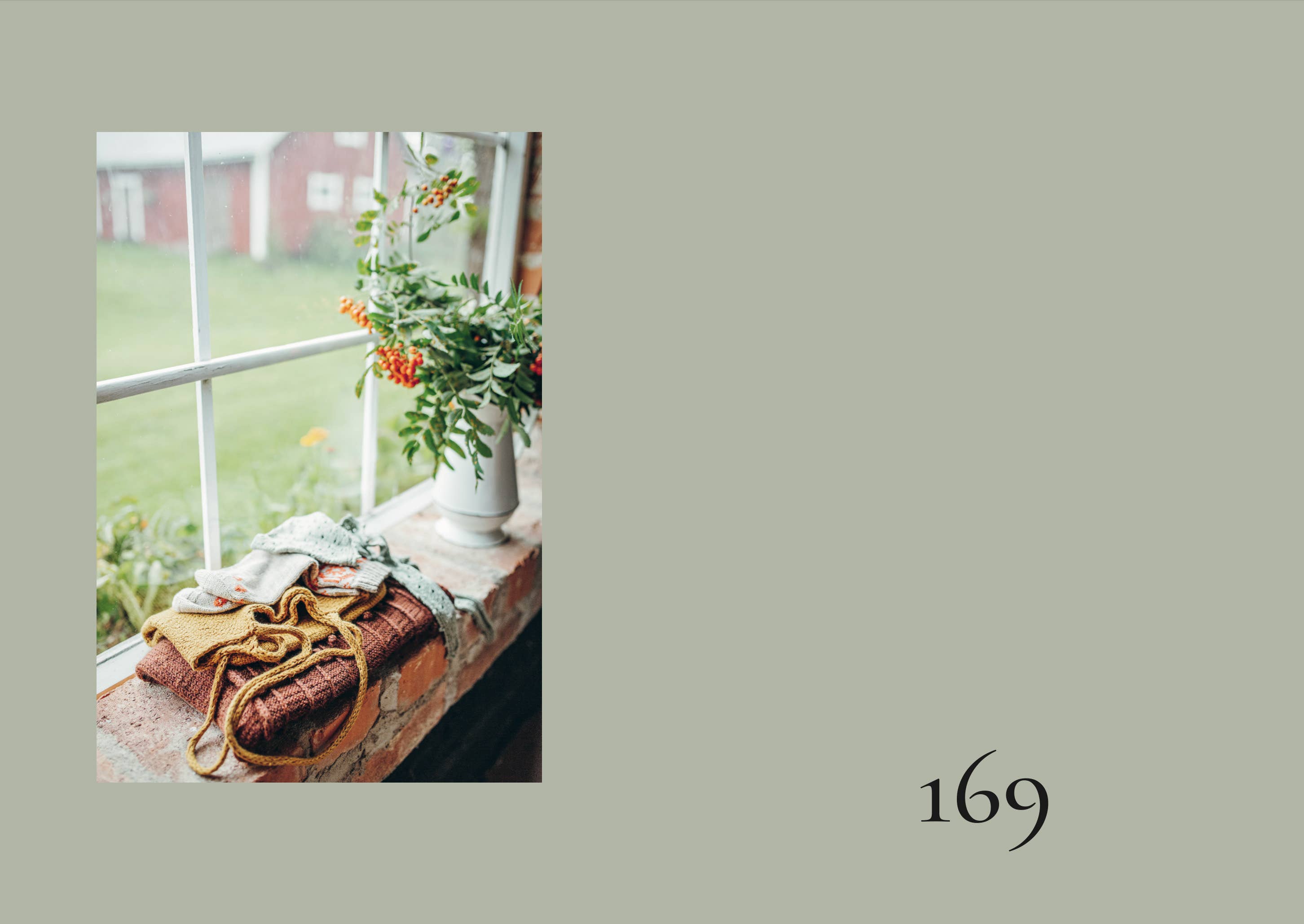 Floral arrangement on a windowsill with a number '169' on a plain background