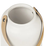 Close-up of the opening of a white ceramic vase with matte finish and faux leather handle 