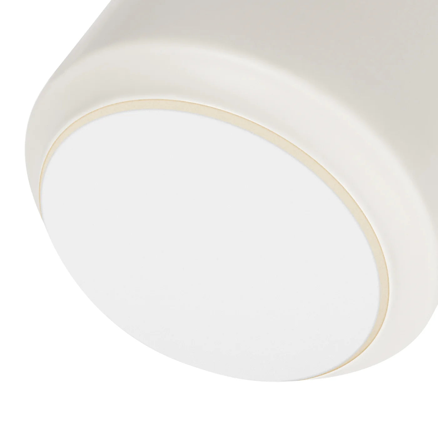 Close-up of the bottom of a white ceramic vase with matte finish and faux leather handle. The bottom has a soft white foam to prevent surface scratches.