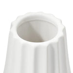 Close-up of a white ceramic vase with a fluted, scalloped rim and vertical fluting on a white background.
