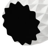 A close-up of a soft surface on the bottom of the vase intended to prevent scratching surfaces.