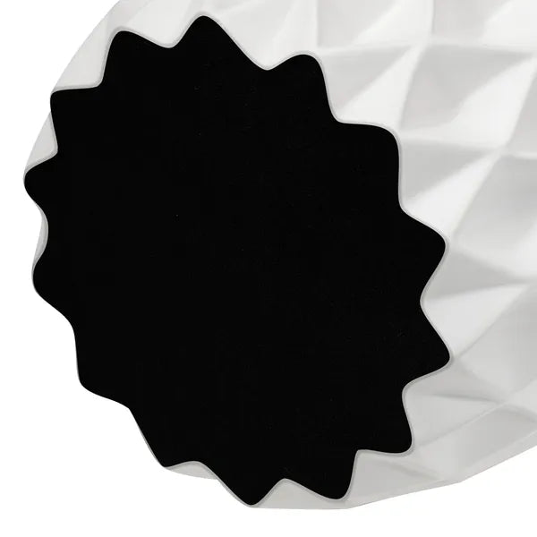 A close-up of a soft surface on the bottom of the vase intended to prevent scratching surfaces.