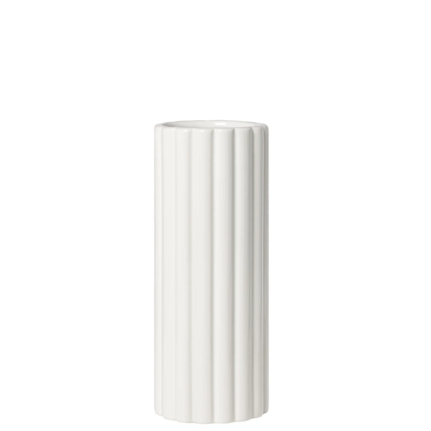 A tall cylindrical vase, whose silhouette is softened by delicate vertical ribbing, creating subtle movement as light shifts across its glossy white surface. 