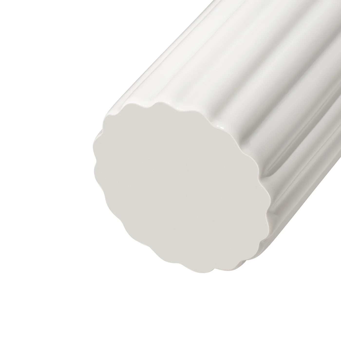 A close-up of the bottom of a tall cylindrical vase, whose silhouette is softened by delicate vertical ribbing, creating subtle movement as light shifts across its glossy white surface. 