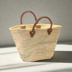 Rustic yet elegant handwoven basket, embodying traditional French charm. Perfect for carrying your market treasures with ease; the sturdy yet supple leather handles provide both durability and a touch of effortless style. 3