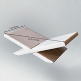 Marble bookstand with measurements on a light gray background