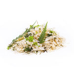 A small mound of stone pine shavings
with moss, lichen, spruce needles,
and fern leaves photographed on a clean white background. 2