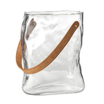 9.5 Inch tall clear glass vase shaped like a paper bag with faux leather. 