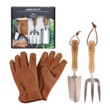Garden tool set with gloves and packaging on a white background