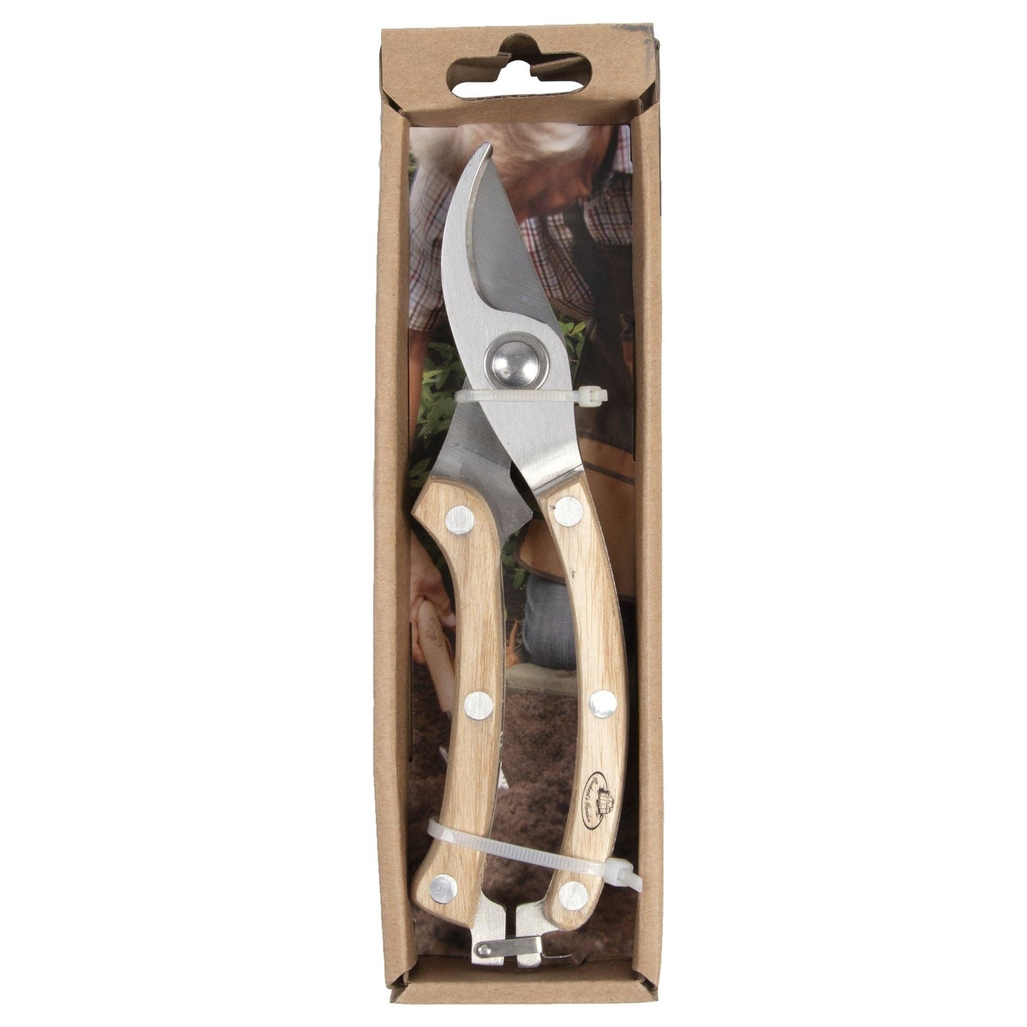 Gardening shears in a cardboard packaging on a white background
